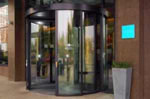 Modern revolving door at hotel entrance